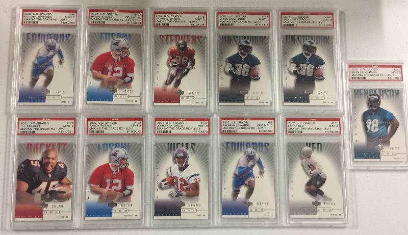 lot 1026 image: 11 2002 UD Graded Football Rookie Cards with Several PSA 10 GEM MINT Cards