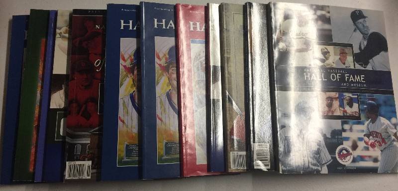 lot 1102 image: Lot of 12 MLB Hall Of Fame Yearbooks from Cooperstown New York
