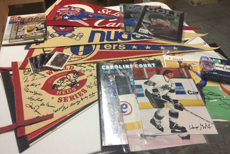 lot 1108 image: Mixed Sports Collectibles Lot MLB Pennants NBA Autograph 8x10s NHL & More