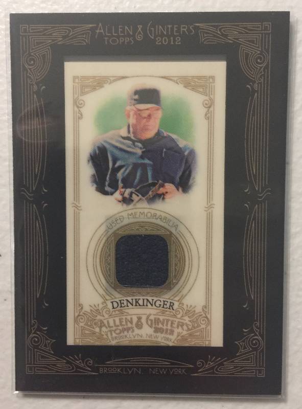lot 1124 image: 2012 Topps Allen & Ginter Dan Denkinger Game Used Material Game 6 Blown Call