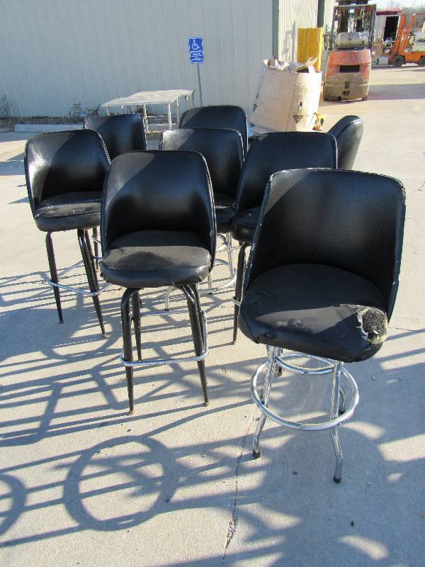 lot 1073 image: (8) Black Vinyl Padded Swiveling Bar Height Chairs