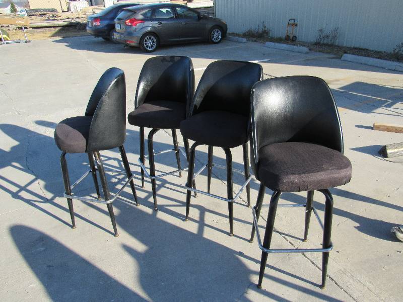 lot 1074 image: (4) Black Vinyl Padded Swiveling Bar Height Chairs