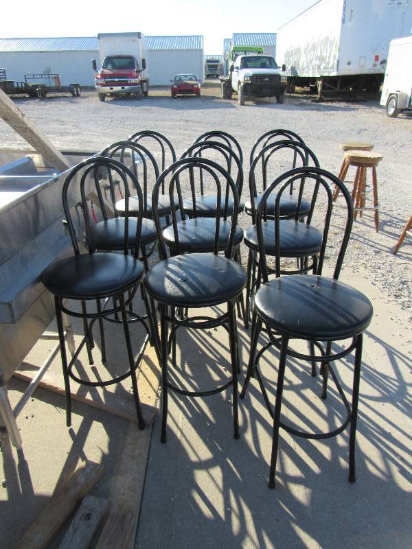 lot 1078 image: (9) Bar Height Black Vinyl Padded Metal Framed Chairs