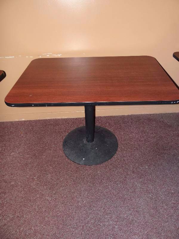 lot 1054 image: Dark Laminated Top Single Metal Base Dining Table