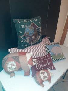 lot 1102 image: Throw pillows. Some are pig shaped. Cute