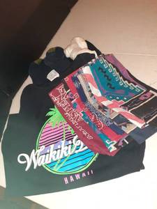 lot 1114 image: Tank top size xl from Waikiki Beach Hawaii, (6) prs. of socks and (7) bandanas