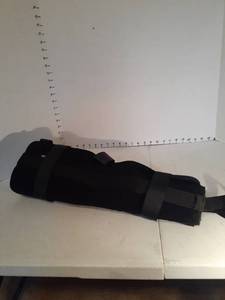 lot 1159 image: Leg brace, knee brace and round, tubular pillow