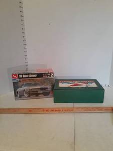 lot 1168 image: 1966 Buick Riviera model car. New In Box. PLUS an empty Eddie Bauer box