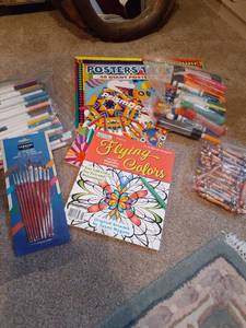 lot 1175 image: Crayons, markers, paint brushes and coloring books