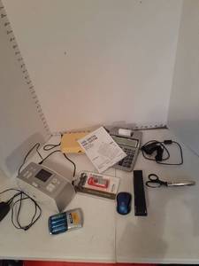 lot 1181 image: Miscellaneous items. HP Photosmart 385, stapler, battery charger, adding machine and more