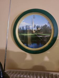 lot 2001 image: Wall clock with golf course background