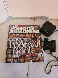 lot 2010 image: Sports Illustrated The Football Book and S.I. binoculars