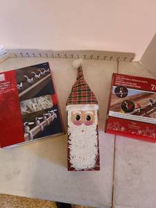 lot 2037 image: Painted Santa brick, LED lights, light clips