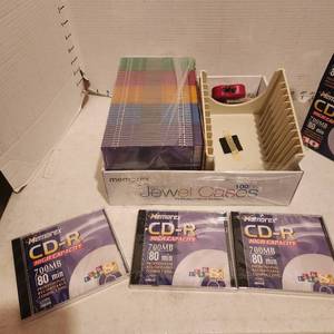 lot 2113 image: 3 Memorex CD-R CDS (new), Jewel CD cases and CD holder