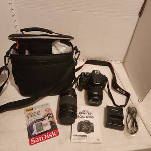 lot 2115 image: Canon EOS Rebel 35mm camera T5, 75-300mm lens, battery charger and new SanDisk and bag