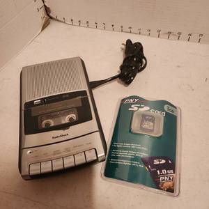 lot 2123 image: PNY SD card 1 gb and RadioShack cassette recorder