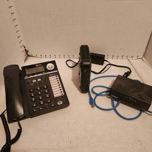 lot 2125 image: Webstar modem, Cisco modem, cable and AT&T telephone