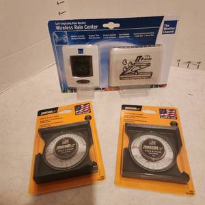 lot 2132 image: Wireless rain center and 2 Johnsons pitch and slope locators all new