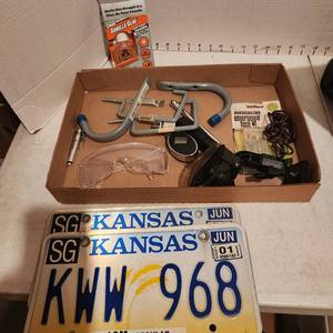 lot 2136 image: Gorilla glue, fuses, garage tool hangers and license plates