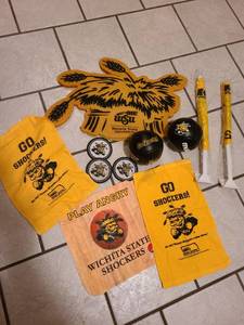 lot 2216 image: WSU Shockers fan items and newspapers of various teams and games