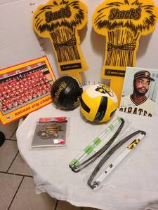 lot 2217 image: Mini WSU volleyballs, car emblem, fan items, pictures of Pirates player Dave Parker and KC Chiefs