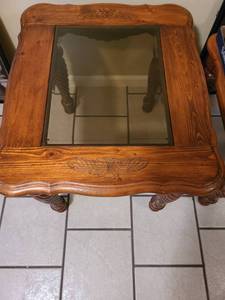 lot 2220 image: Beveled glass and wood end table 24 x 28 x 23. Matches lots 2221 and 2222.