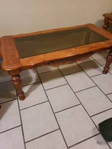 lot 2221 image: Beveled glass and wood coffee table 50 x 26 x 19. Matches lots 2220 and 2222.