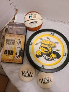 lot 2223 image: WSU wall clock, mini basketball, stone coasters, DVDs