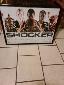 lot 2226 image: Framed poster of WSU womens basketball team 21 x 29