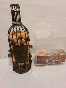lot 2230 image: Corks in metal display 14 tall with additional corks