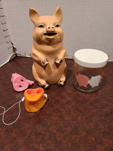 lot 2288 image: Ceramic pig figure 9 tall, rubber pig snouts, pig jar with lid