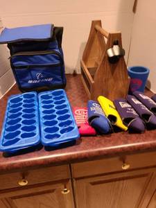 lot 2291 image: Wooden bottle carrier with opener, Boeing lunch bag, koozies, ice trays
