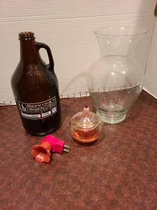 lot 2296 image: Glass growler, diffuser, vase, scent plug-in