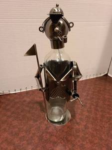 lot 2301 image: Wine bottle holder golfer