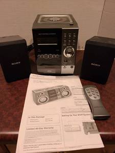 lot 2308 image: Presidian CD player and radio with remote and Sony speakers