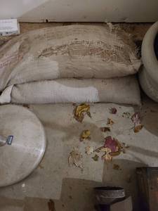 lot 3027 image: Two sandbags, one is breaking apart, so bring a bucket or two