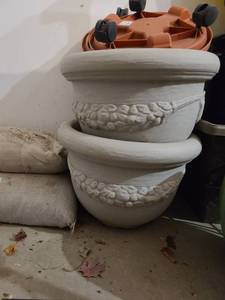lot 3028 image: 2 resin flower pots 11 tall and 2 plant caddies