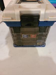 lot 3053 image: Plano tackle box, dusty on the outside but pristine on the inside