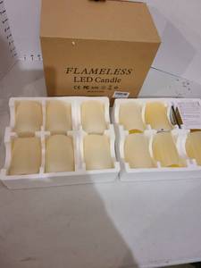 lot 3063 image: Twelve cream color flameless LED candles, 4 x 3 with remote