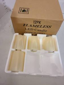 lot 3064 image: Four cream color flameless LED candles, 4 x 3