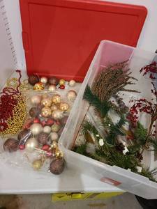 lot 3069 image: Red and gold glass ornaments, bead garland, 56 qt. tote with greenery