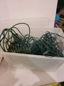 lot 3073 image: Holiday lights, timer, extension cord, 66 qt. storage container.