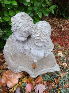 lot 4000 image: Cement boy and girl reading 22 x 15