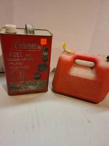 lot 4028 image: Coleman fuel can and a one gallon plastic gas can