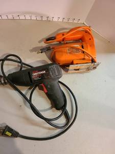 lot 4080 image: Craftsman electric drill and Black and Decker electric jigsaw