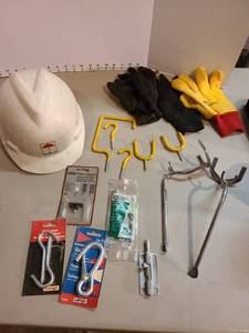 lot 4084 image: Hard hat, garage utility hooks, fishing rod holders, more