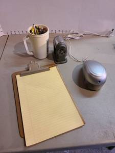 lot 4094 image: Pencil sharpeners, pencils and clipboard