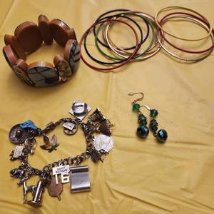 lot 1303 image: Ladies bracelets, charm bracelet and earrings