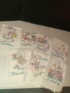 lot 1109 image: Hand embroidered tea towels. With pigs and days of week