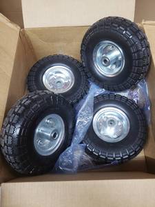 lot 2413 image: Set Of 4 10 Plastic Wheels
